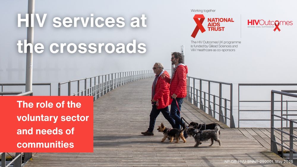 Two people wearing red coats and walking three dogs walk across a pier. Text on top of image reads: HIV Services at the crossroads: The role of the voluntary sector and needs of communities. Logos for National AIDS Trust and HIV Outcomes are on the top right hand side.