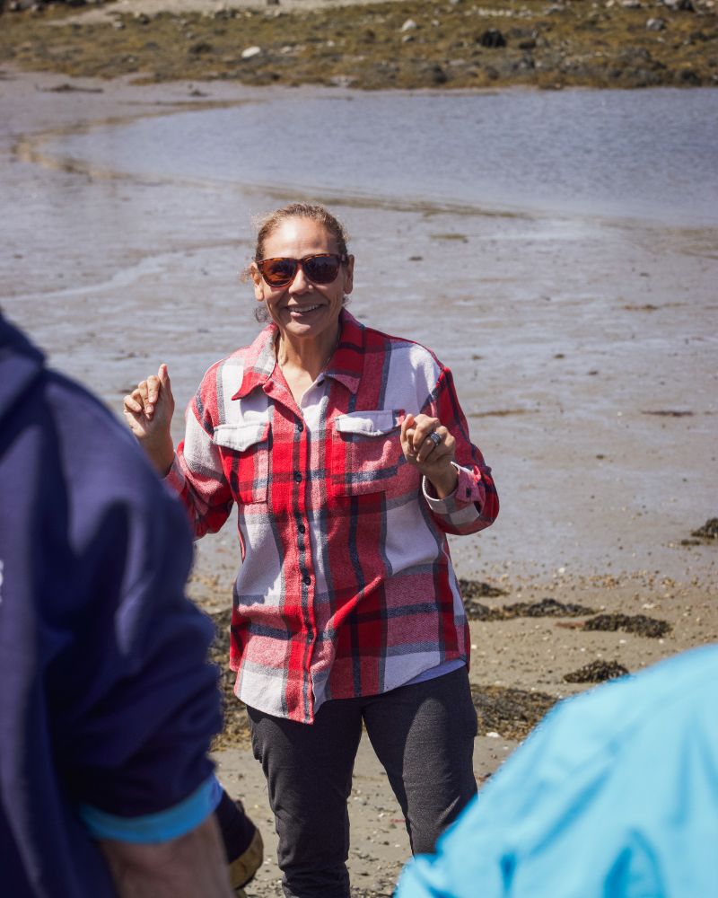 Dr. Gabriela Bradt speaks to the group about green crabs. 