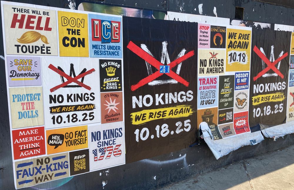 Wheatpasted large scale posters for No Kings protest Oct 18.