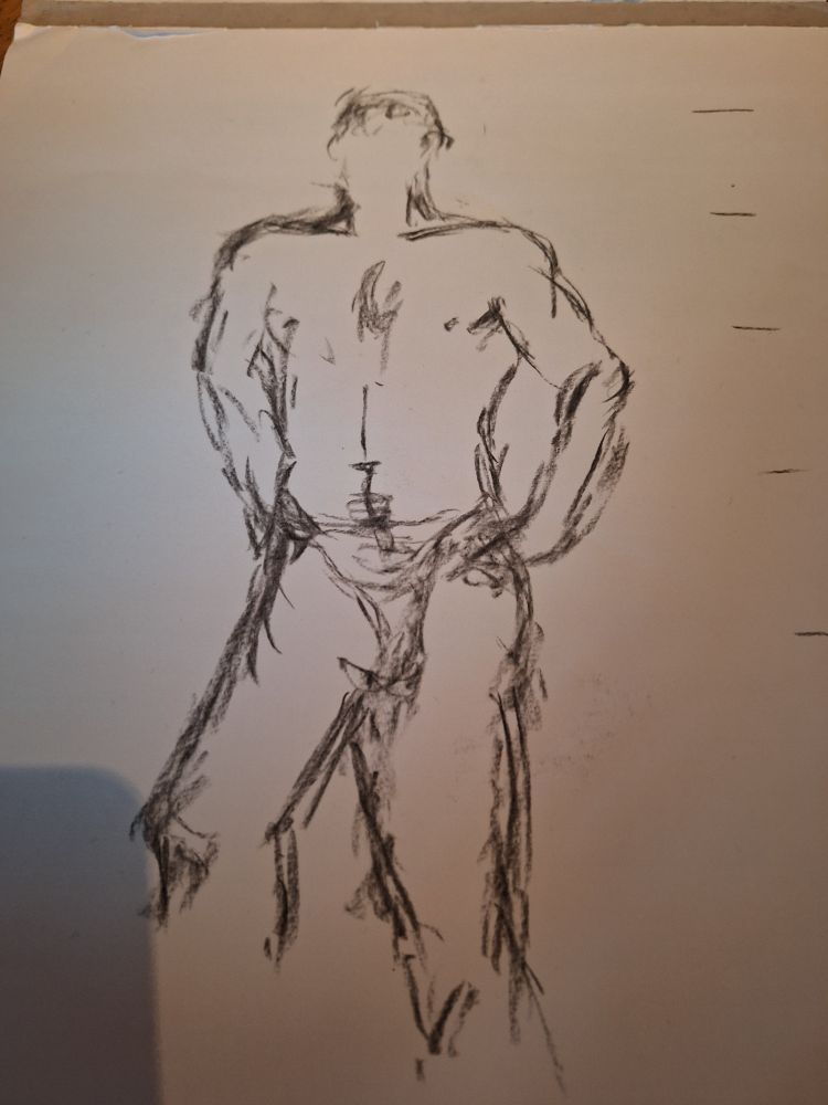 A charcoal sketch of a naked boobless human facing the artist. Head, hands and feet haven't been drawn because they were too tricky.