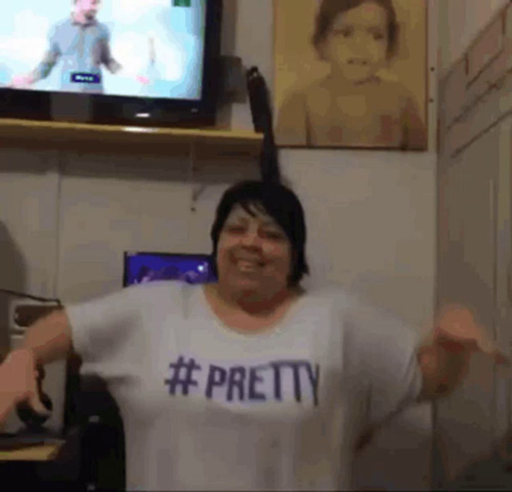 a woman is wearing a shirt that says #pretty on it