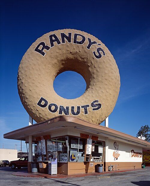 The iconic Randy's Donuts, giant donut on the roof of a small 24-hour donut stand, used as a meme in the Simpsons Monorail episode etc. 

Public Domain image c/o Wikipedia.
