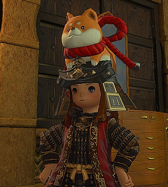 Lalafell woman with a shiba samurai hat on.
