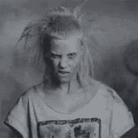 Yolandi Visser or Die Antwoord bops her head and bites her lip. Black and white gif clip from their video I Fink U Freeky.