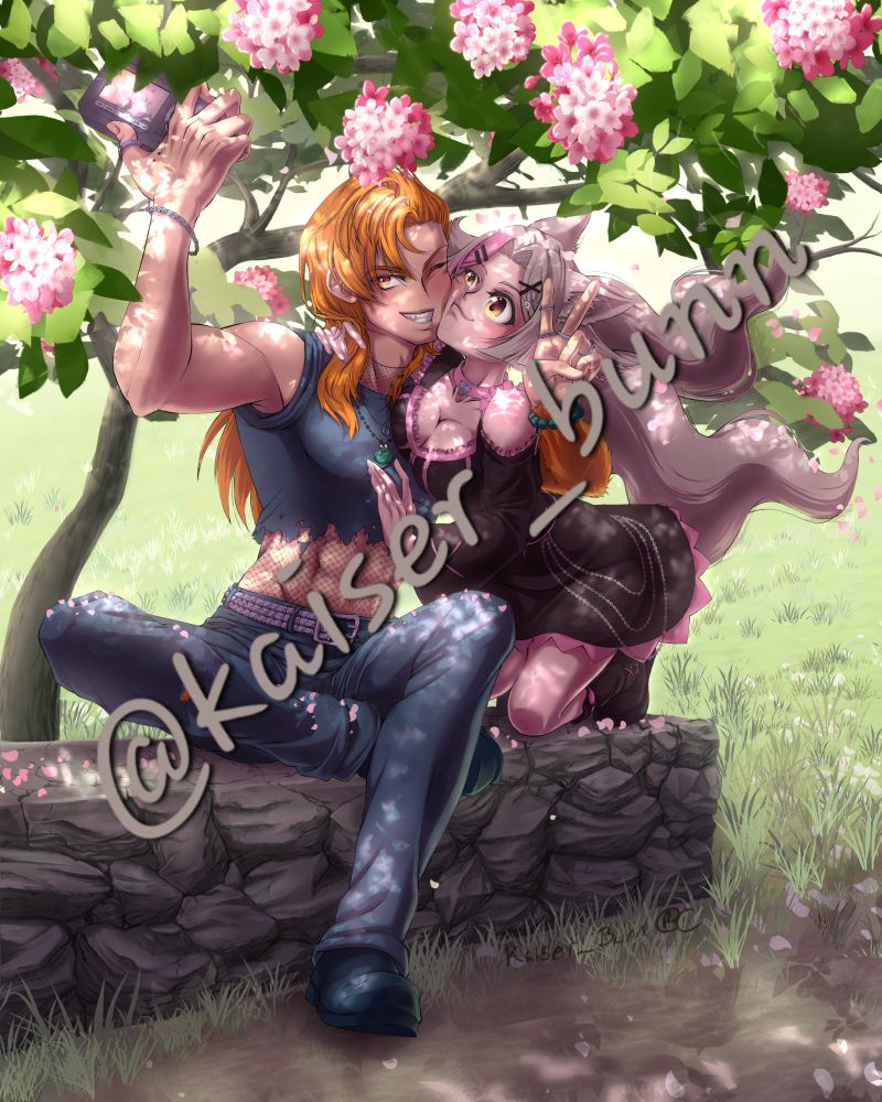 Two people sitting together on a stone bench during a sunny day, cuddling and taking a picture together.