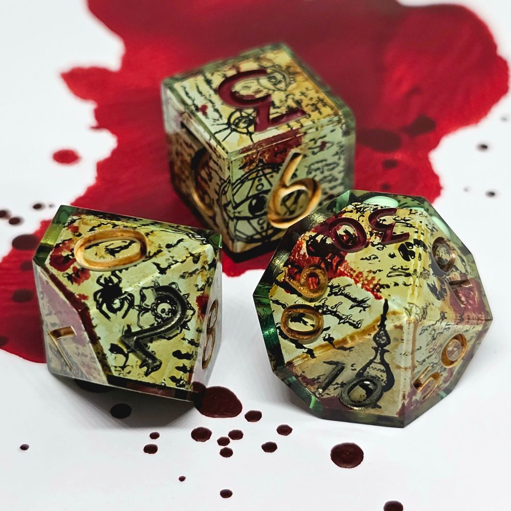 Another photograph of the commissioned dice set "Heretic Ritual". This photo is of the D6, D10 and D%.