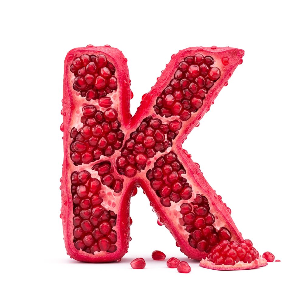 3D Letter K – Pomegranate Seed Typography
