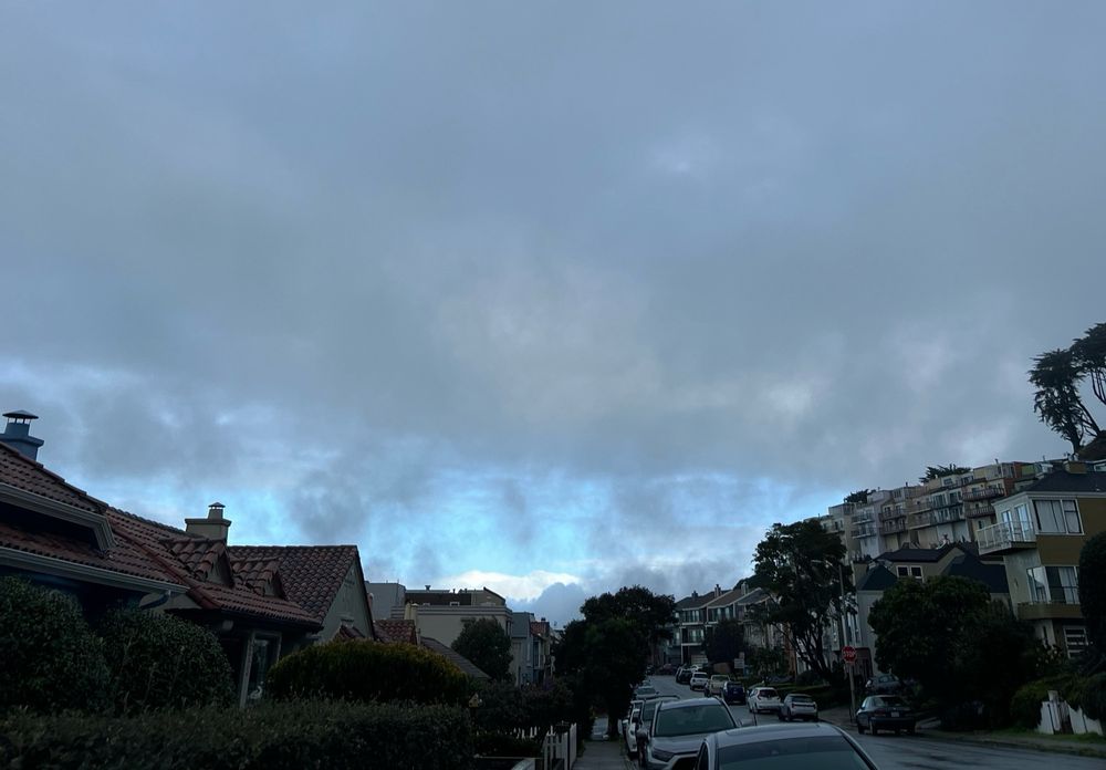 A little peep of blue sky amidst a foggy cloudy sky