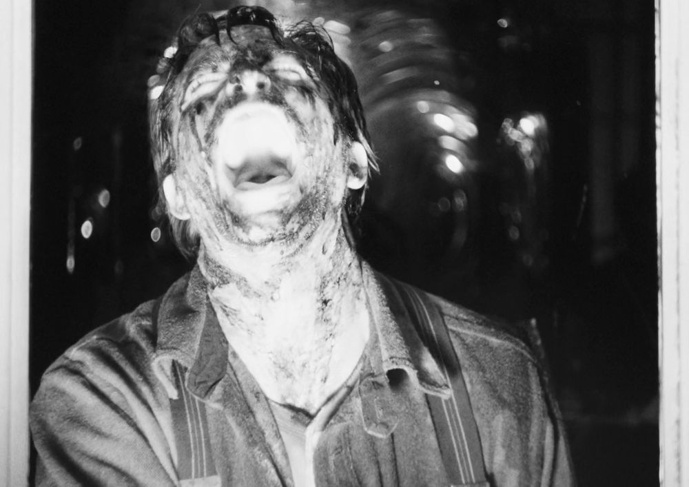 Robert Pattinson in The Lighthouse, screaming. With joy? With madness? In pain? Who can say.