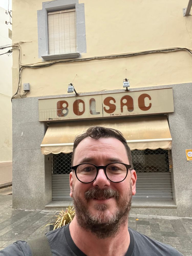 Selfie outside a shop in Canet de Mar naked Bolsac which to English speakers sounds like ballsack.