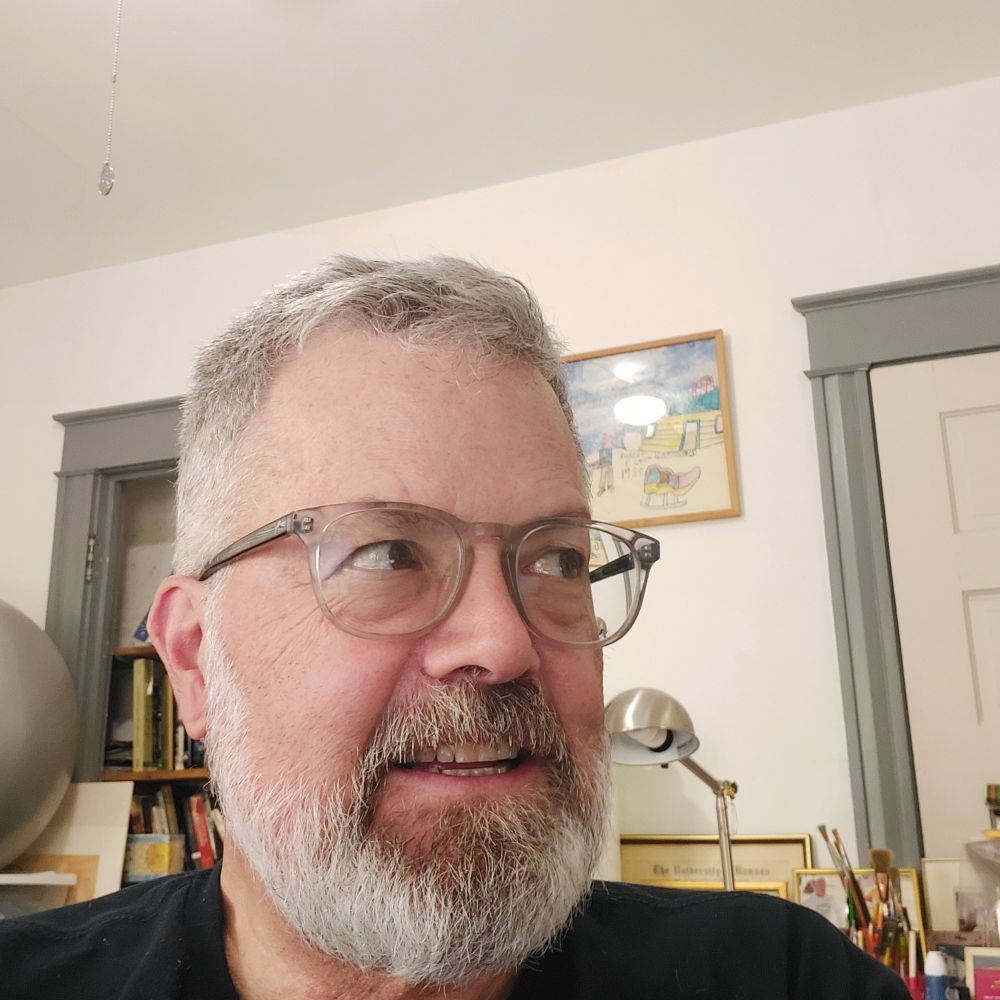 At my desk, trying to not look at my phone. 