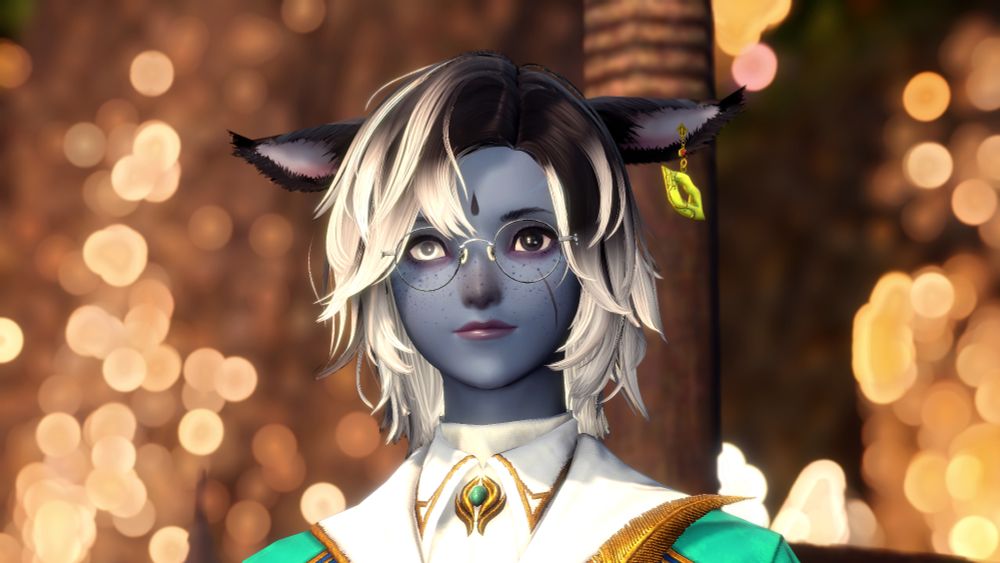 An upward facing shot of Miah smiling as she looks ahead