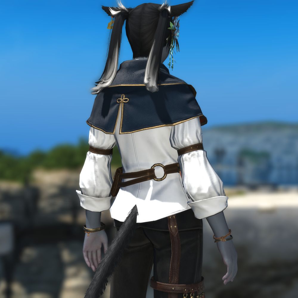 Miah wearing a Cauldronsoph Mantle without the cape.