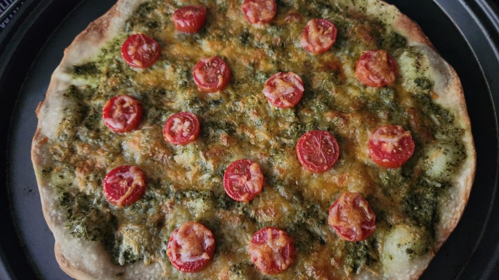 Made green sauce (there's probably 20 ingredients and I'm too lazy to list) and decided it would be great on some flat bread. Ultimately turned into pseudo-pizza with some sliced cherry tomatoes and shredded cheese.