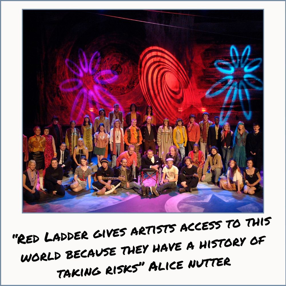 A cast on stage in 60s costumes with psychedelic lights behind. 
The picture is labelled: "Red Ladder gives artists access to this world because they have a history of taking risks." Alice Nutter. 