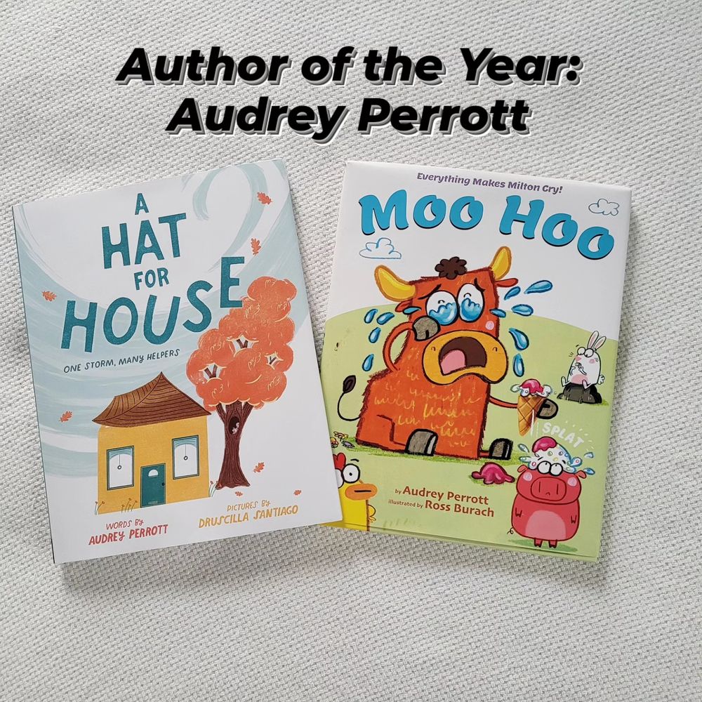 Text reads: Author of the Year, Audrey Perrott, with book covers for Moo Hoo, showing a sobbing cow holding an ice cream cone, and A Hat for House, with a yellow house next to a tree with orange leaves.