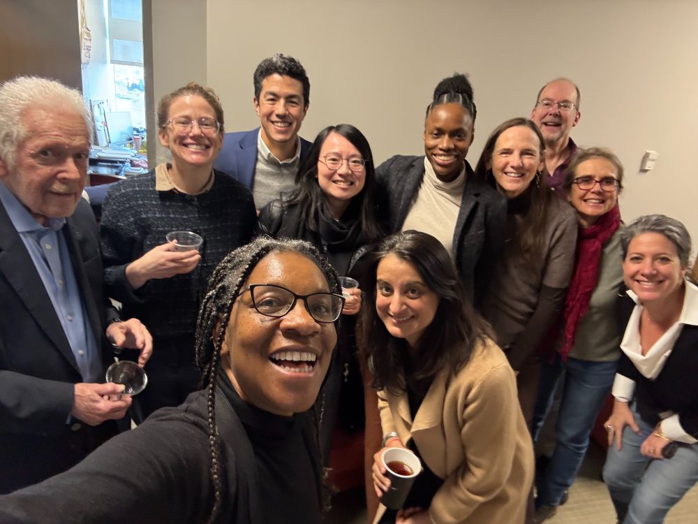 group photo of me and some of my colleagues drinking champagne