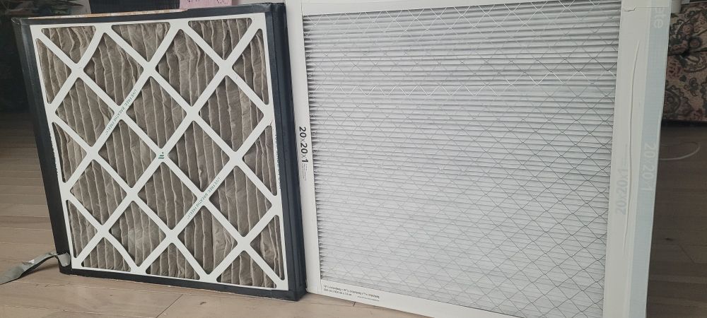 Old dirt air filter on left, clean new air filter on the right. 