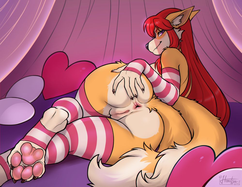 Vixen wearing stripped stockings holding her cheeks apart exposing herself on a bed with heart shaped pillows looking at the viewer seductively.