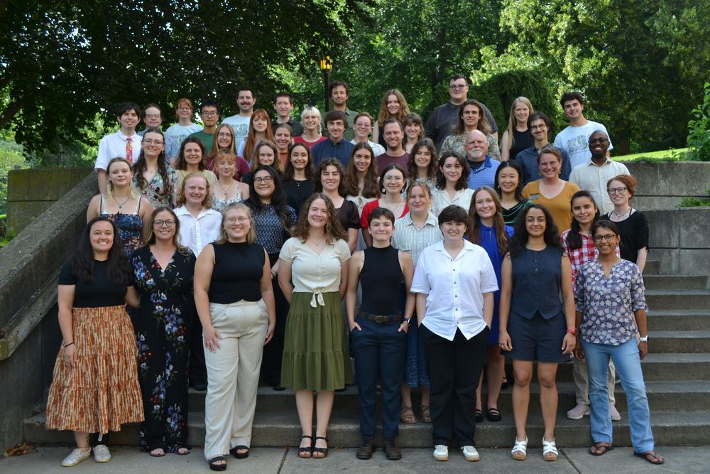 Group photo of the 2025 KBS undergraduate summer cohort, along with their mentors, taken on an outdoor staircase.
