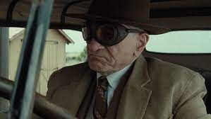 Robert Deniro in "Killers of the Flower Moon" wearing goggles