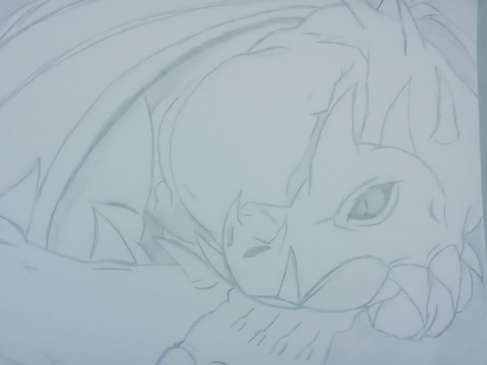 Desenho em papel de um dragão
