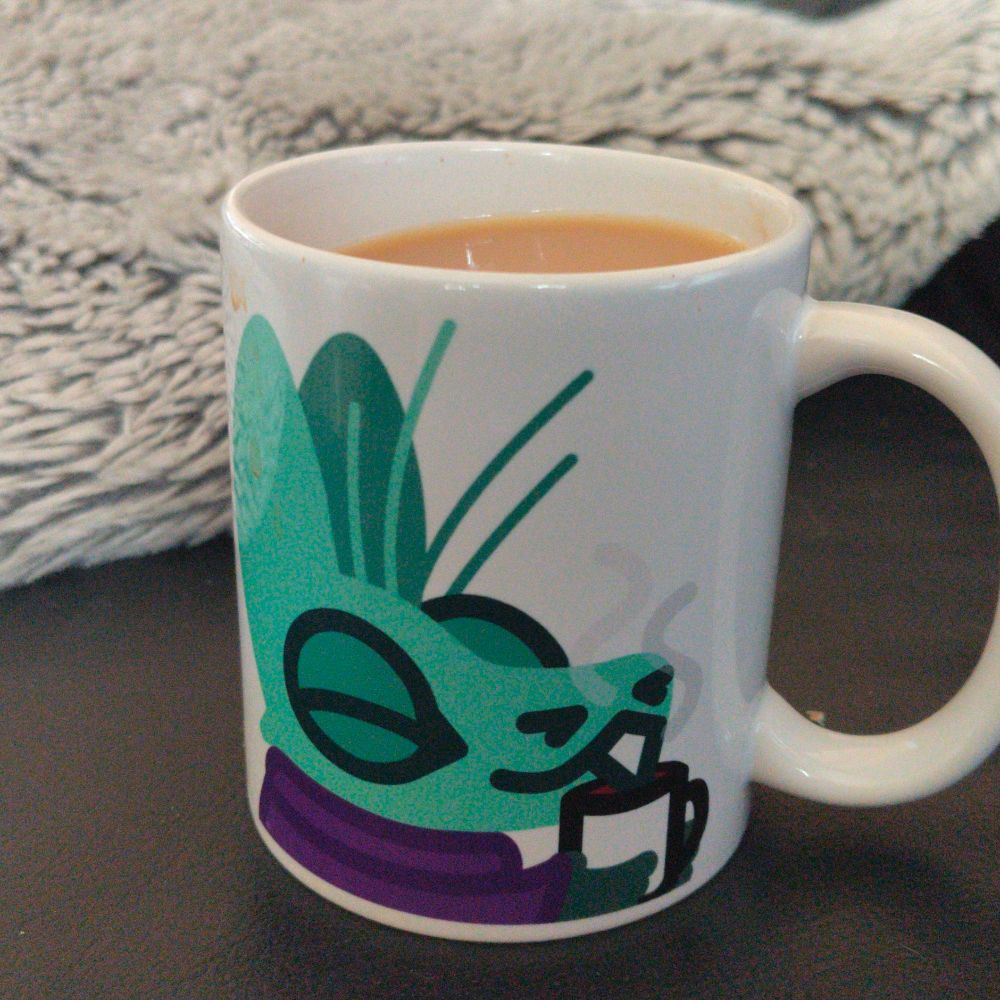now its full of tea and its showing off the blue side and yes i have already made a mess of it
