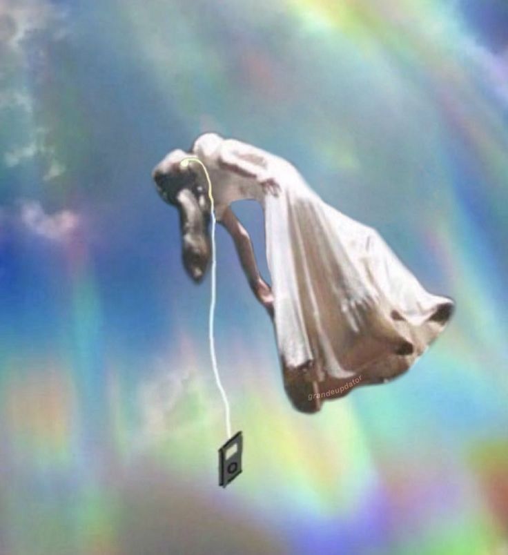 A woman in a long white dress is flying into the sky while listening to her mp3 player 
