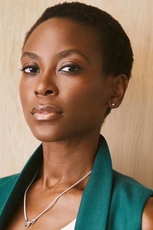 A headshot of Ifeachor, a lovely Black woman with a wise look in her dark brown eyes.