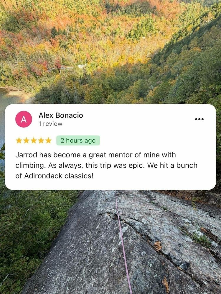A climbing rope stretches across a rocky surface with dense, colorful autumn forest below. Text reads Alex Bonacio 1 review Jarrod has become a great mentor of mine with climbing. As always this trip was epic. We hit a bunch of Adirondack classics! 2 hours ago.