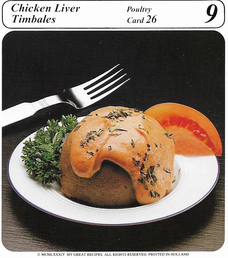 a vintage thumbnail photo of plated chicken liver timbales, a dome-shaped food item covered in an orange sauce, flecked with what appears to be chives and flanked by a tomato wedge and a sprig of parsley
