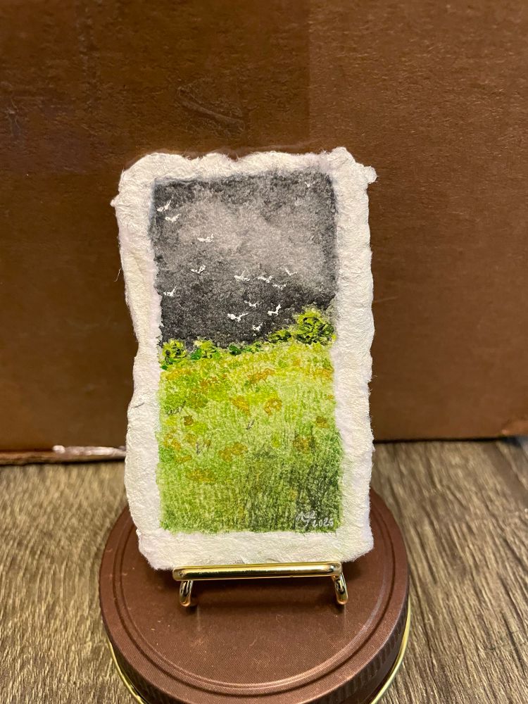 Mini watercolor painting of a summer storm 