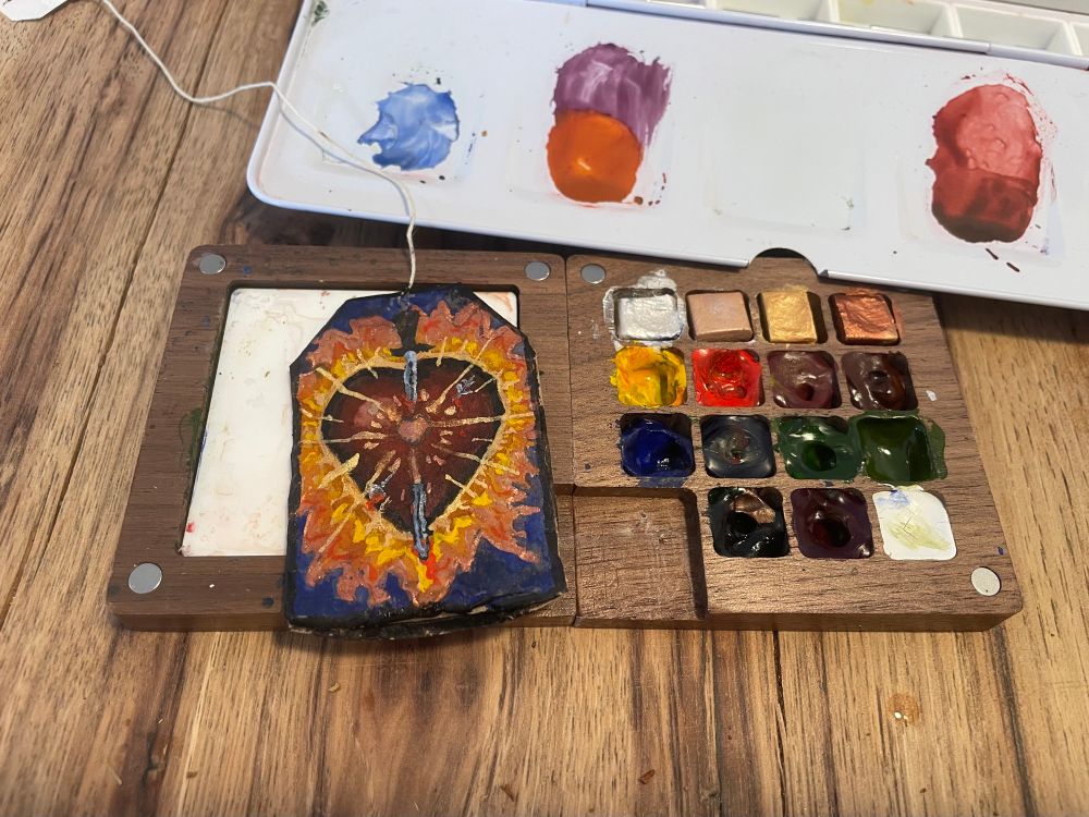 Mini painting of sacred heart on a teabag