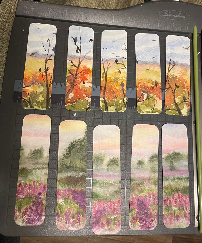Seasonal watercolor bookmarks—spring and autumn landscapes