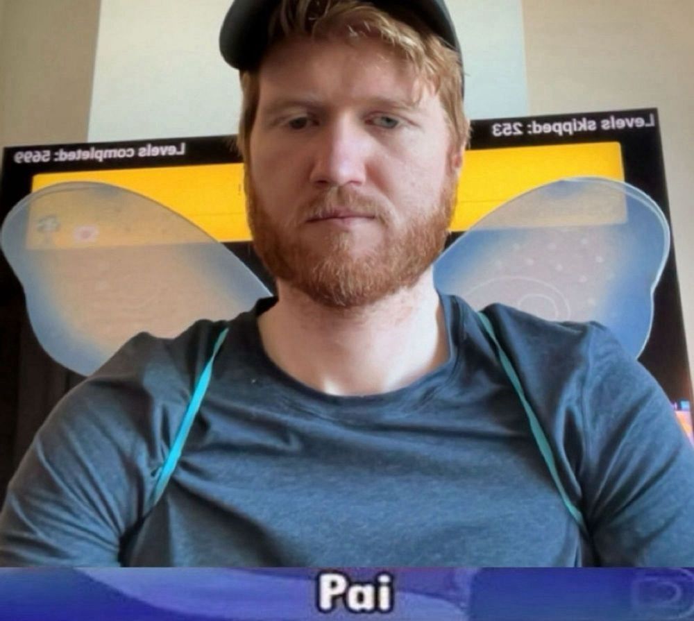 a photo of Paul aka Pai wearing butterfly wings