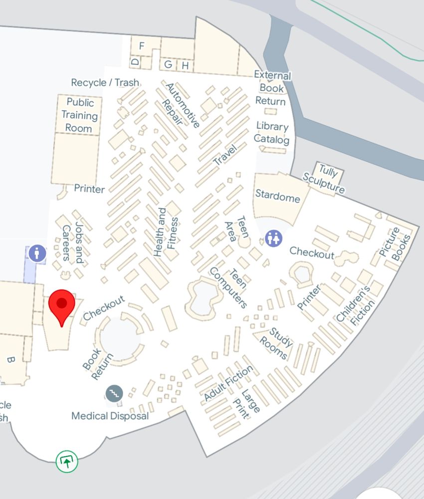 Picture of a map showing zoomed in library with library stacks, desks and labels for each library section