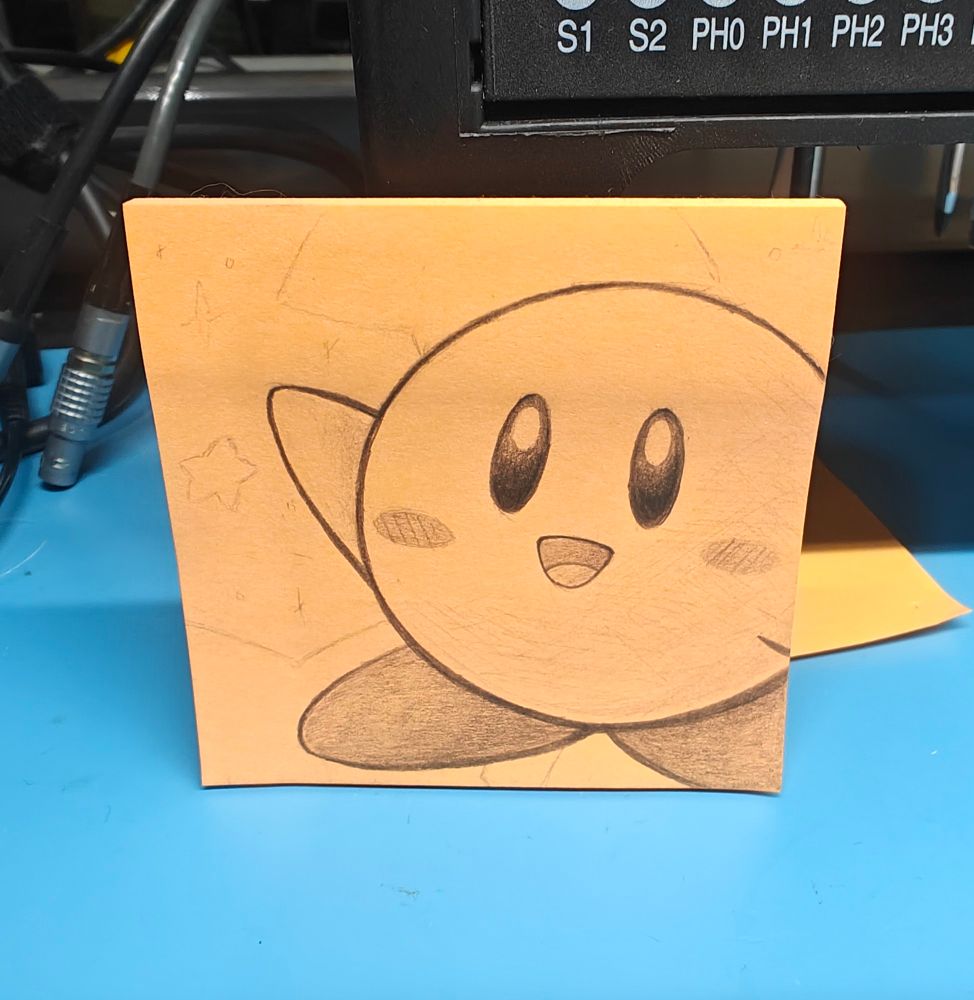 A little Kirby on a sticky note waving at you and smiling ☺️
