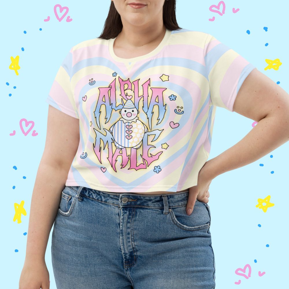 Pastel clowncore crop top that says "Alpha Male" with a cute clown guy in the middle and little doodles around