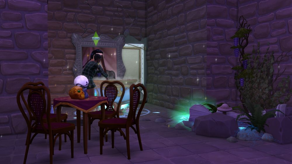 From eye level again, a view of the seance table standing in front of Melody while she is brewing a potion. We can see the crushed lantern, still lit, with plants growing from the light and heat from it despite being deep underground. There are also two frames on the ground, help up against the wall. That look like they have fallen but were put back upright by Melody to free up the cauldron.
