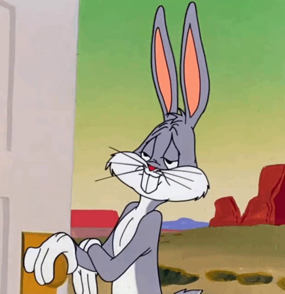 bugs bunny is standing in front of a door with his hand on it