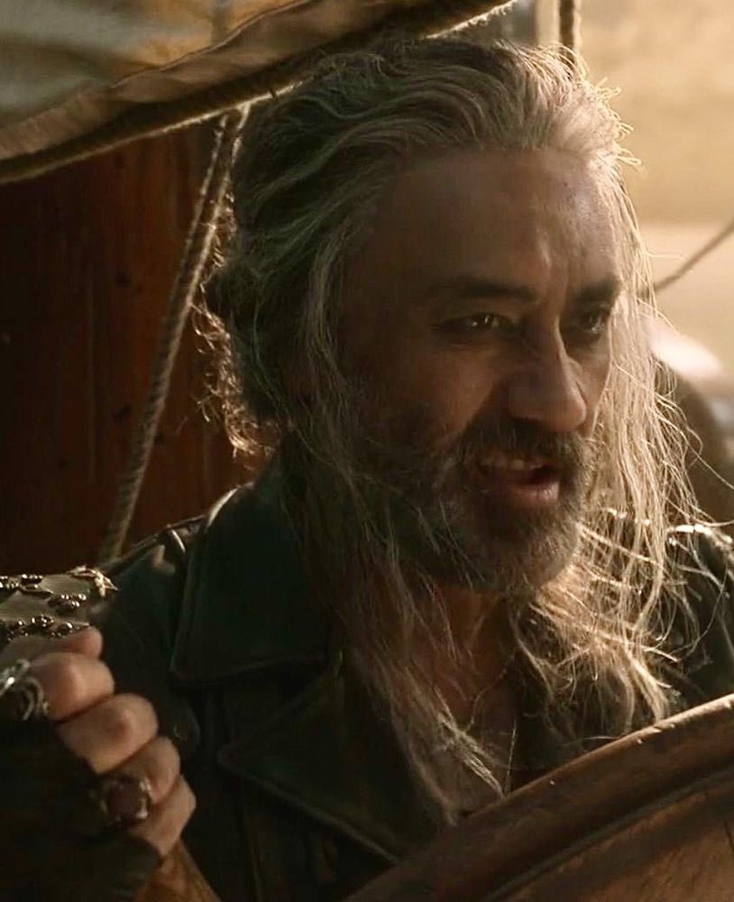 Ed looking feral as he turns the ship into the storm 