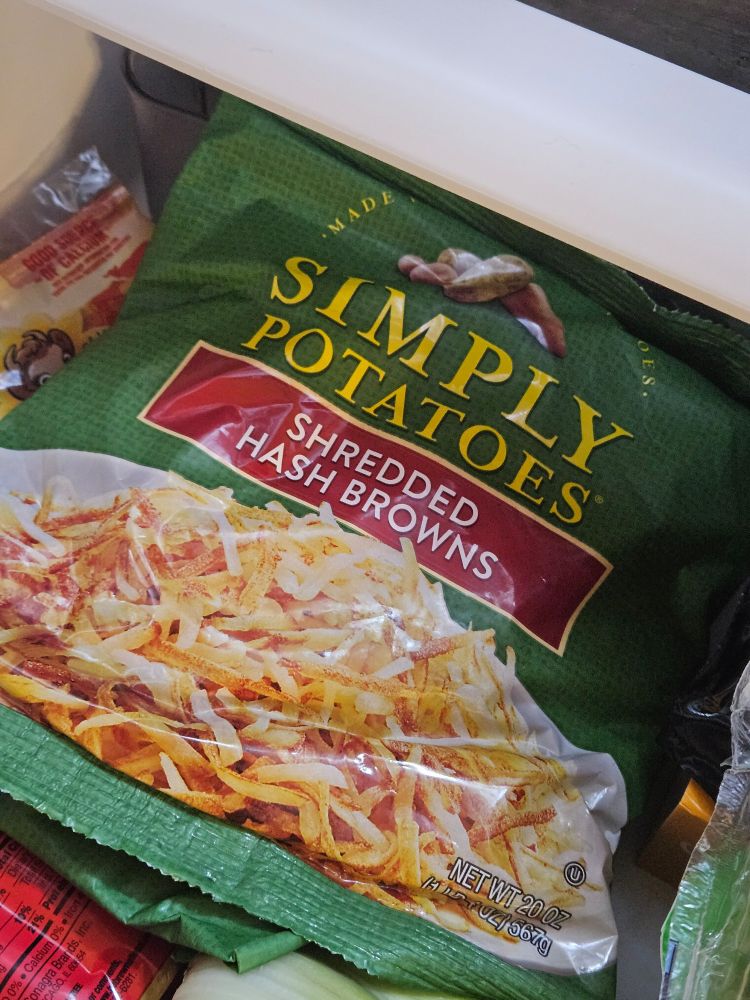 A picture of a bag of "Simply Potatoes" brand hash browns