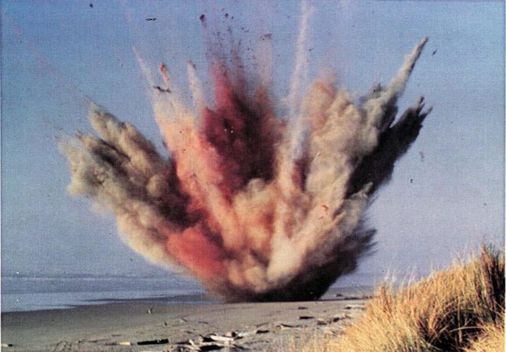 Technicolor pic of the explosion that rained whale blubber, etc. on folks watching.