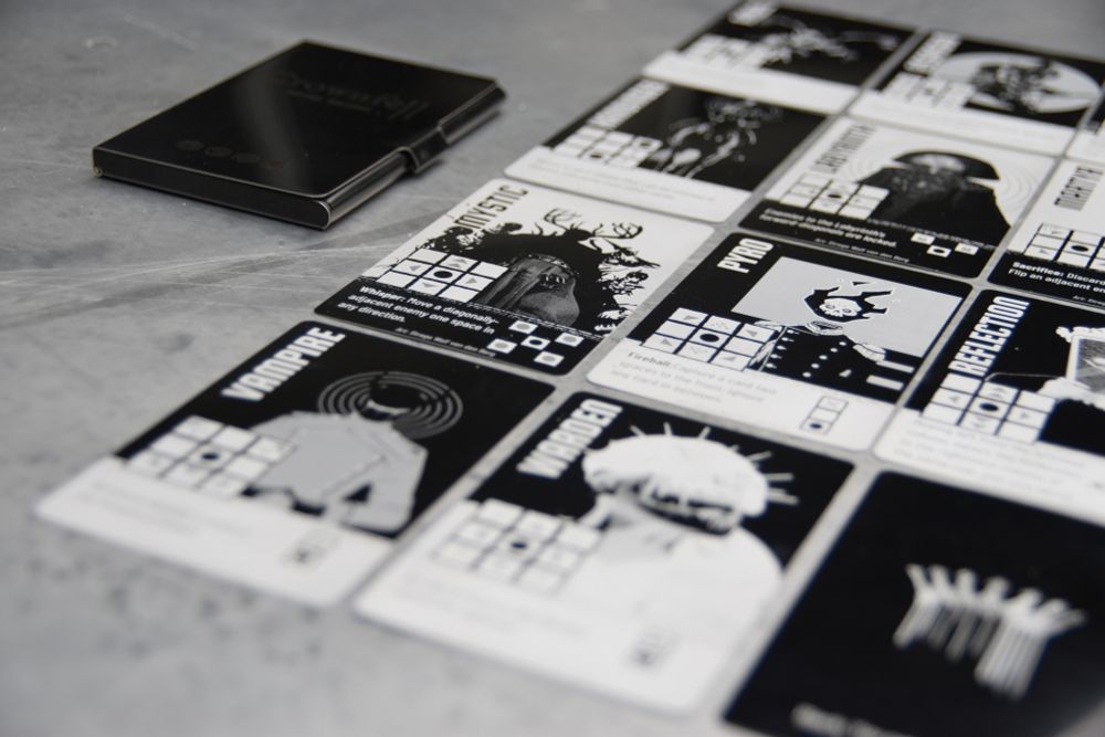 A grid of Crownfell cards sitting next to the wallet.