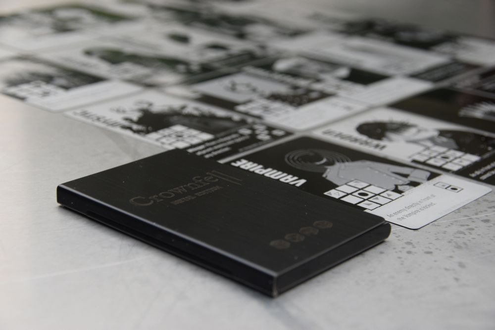 A grid of Crownfell cards sitting next to the wallet.