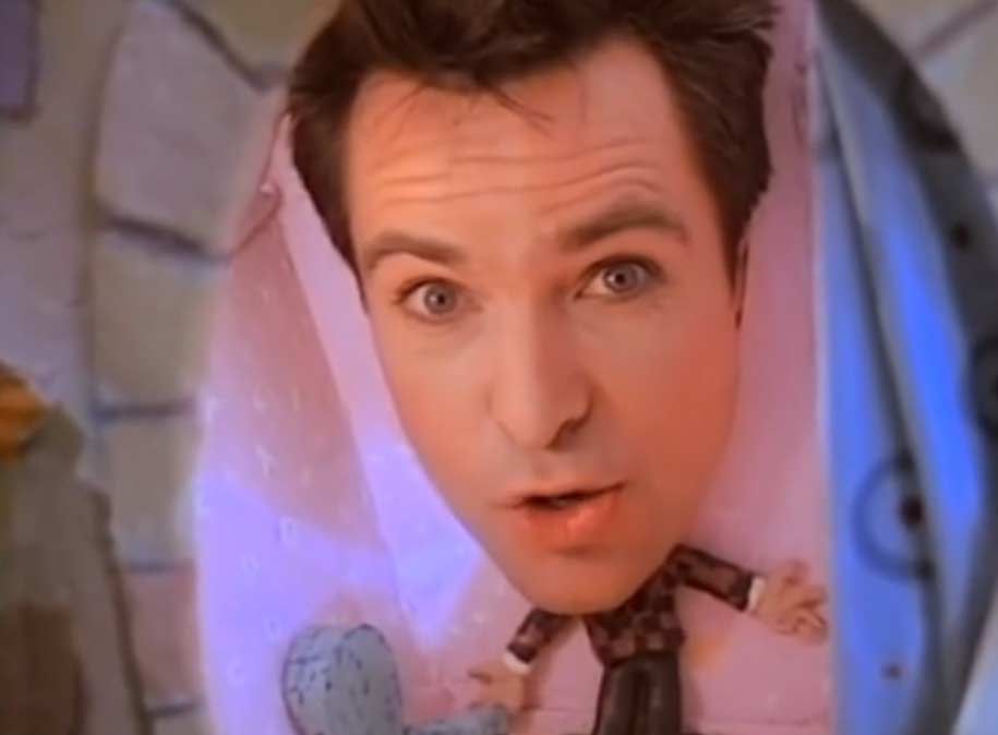 Peter Gabriel's head on a tiny claymation body from the music video for "Big Time"