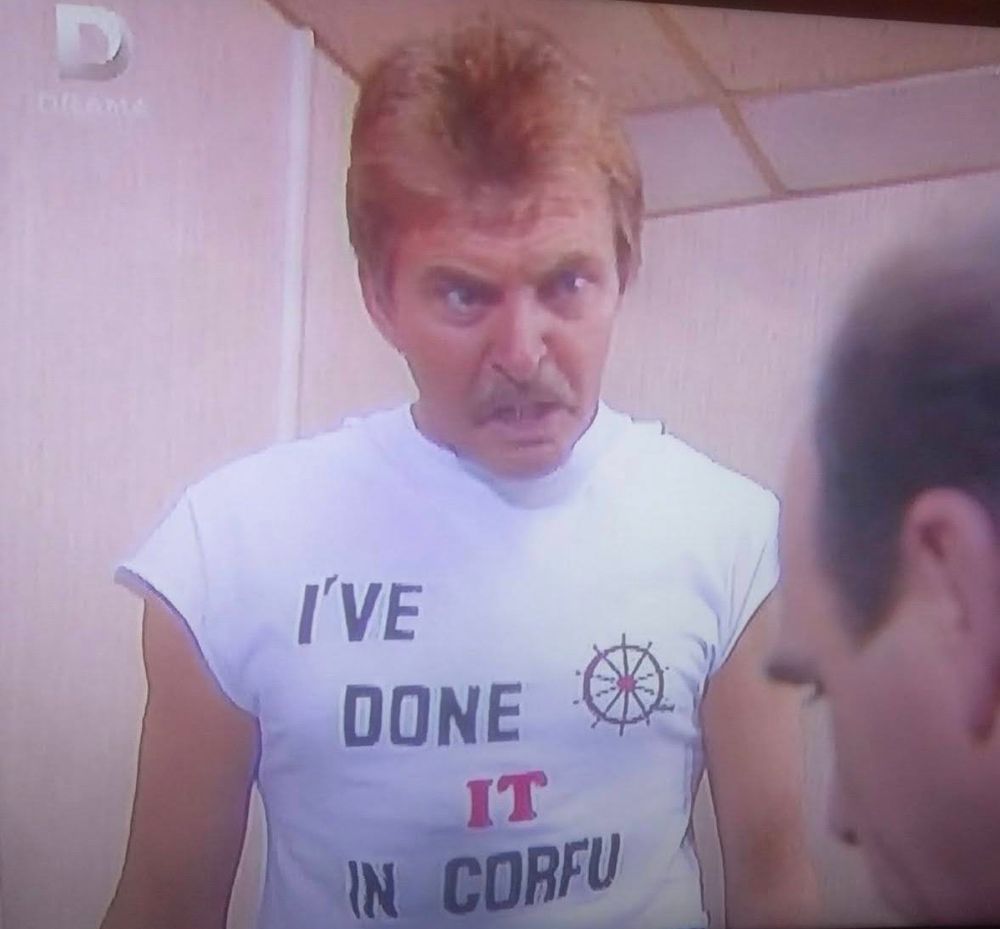 Ted Roach in a "I've done it in Corfu" t-shirt 
