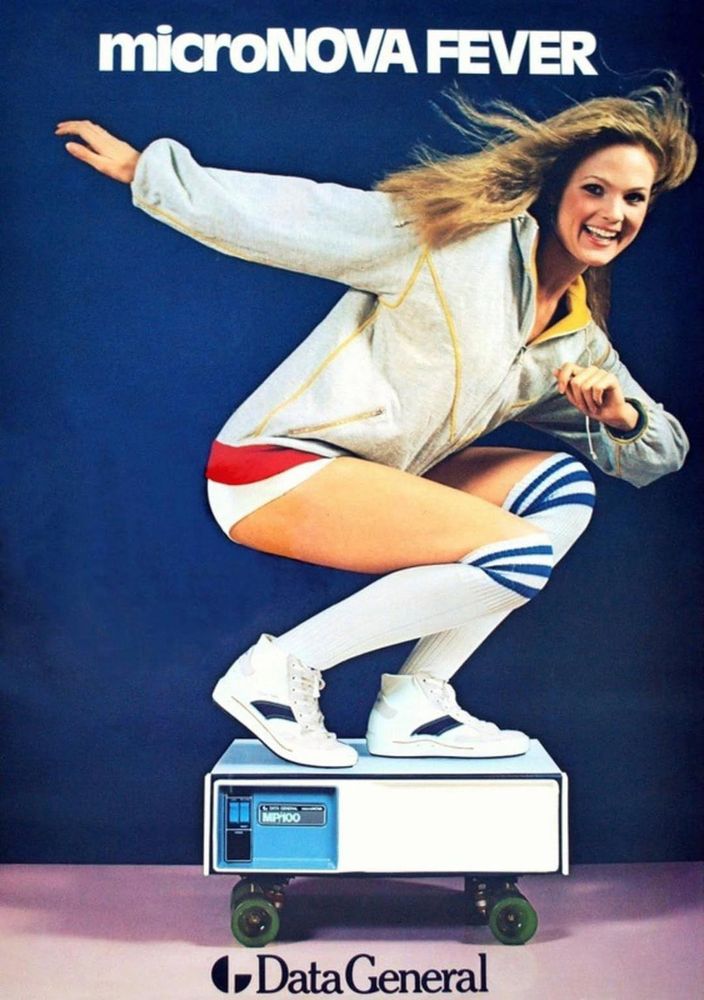 Image is a vintage advertisement poster featuring a woman with light skin and long, flowing blonde hair, smiling energetically. She is wearing a white jacket with a yellow zipper, red and white shorts, and knee-high white socks with blue stripes. She is posed as if skateboarding on a computer, specifically a Data General microNOVA MP/100, which is mounted on a skateboard. The background is a solid dark blue. At the top of the image, the text 'microNOVA FEVER' is displayed in bold, white, sans-serif font. At the bottom, the 'Data General' logo is present in black, with a stylized 'G' symbol next to the text. The overall layout is dynamic, capturing a sense of movement and excitement.