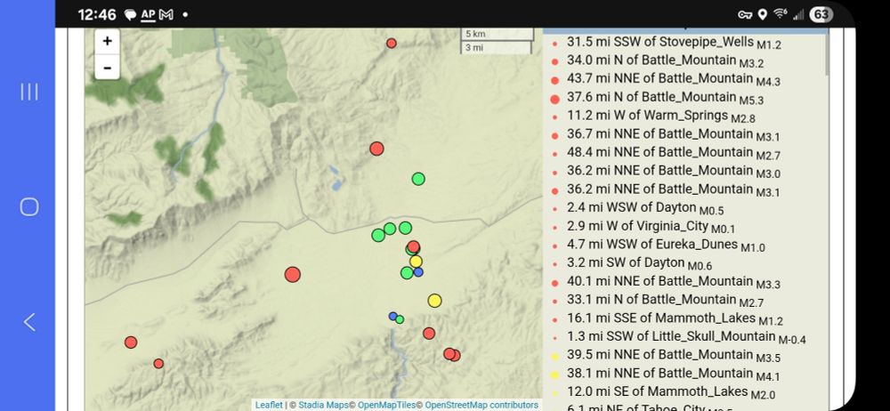 Screenshot from the Nevada Seisomological Laboratory showing a cluster of dots ranging from red (less than 12 hours ago), yellow (12 to 24 hours ago), green (24 to 48 hours ago), and blue (48 to 168 hours ago). List on the right side shows all recent quakes, not only the ones in the image. 31.5 mi SSW of Stovepipe_Wells M1.2 34.0 mi N of Battle_Mountain M3.2 43.7 mi NNE of Battle_Mountain M4.3 37.6 mi N of Battle_Mountain M5.3 11.2 mi W of Warm_Springs M2.8 36.7 mi NNE of Battle_Mountain M3.1 48.4 mi NNE of Battle_Mountain M2.7 36.2 mi NNE of Battle_Mountain M3.0 36.2 mi NNE of Battle_Mountain M3.1 2.4 mi WSW of Dayton M0.5 2.9 mi W of Virginia_City M0.1 4.7 mi WSW of Eureka_Dunes M1.0 3.2 mi SW of Dayton M0.6 40.1 mi NNE of Battle_Mountain M3.3 33.1 mi N of Battle_Mountain M2.7 16.1 mi SSE of Mammoth_Lakes M1.2 1.3 mi SSW of Little_Skull_Mountain M-0.4 39.5 mi NNE of Battle_Mountain M3.5 38.1 mi NNE of Battle_Mountain M4.1 12.0 mi SE of Mammoth_Lakes M2.0 6.1 mi NE of Tahoe_City M0.5