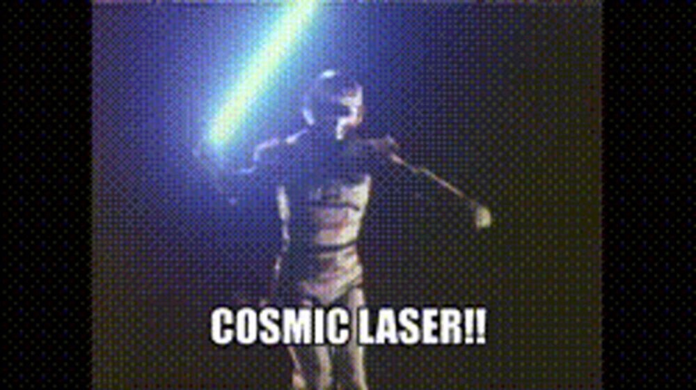 a man is holding a light saber and says cosmic laser !!